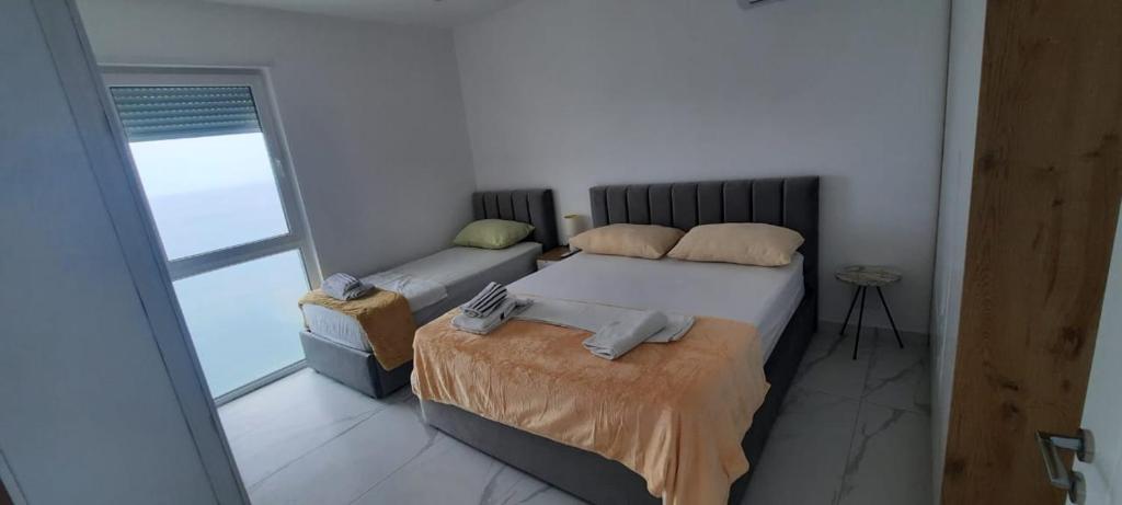 Postel nebo postele na pokoji v ubytování Apartamento Vista sul Mare