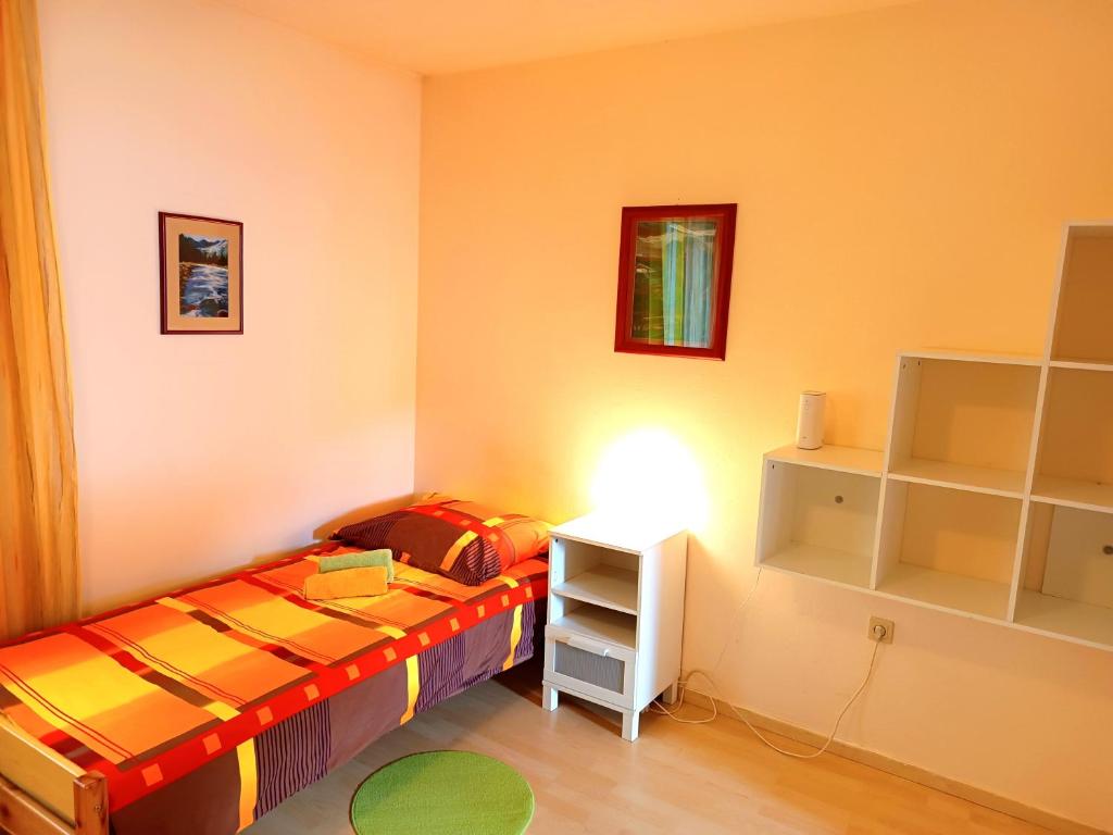 Postel nebo postele na pokoji v ubytování Hotel Zemlinski
