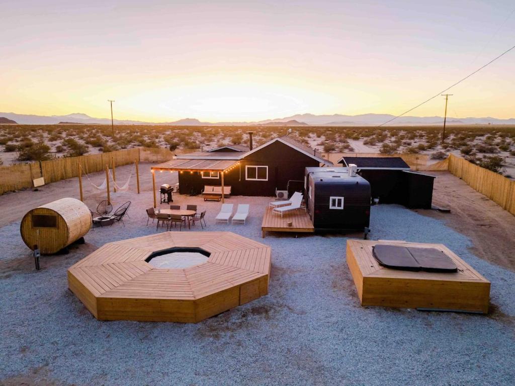 a campground in the middle of the desert at Remote Home Shroom Room Hot Tub Pool Sauna in Sunfair Heights