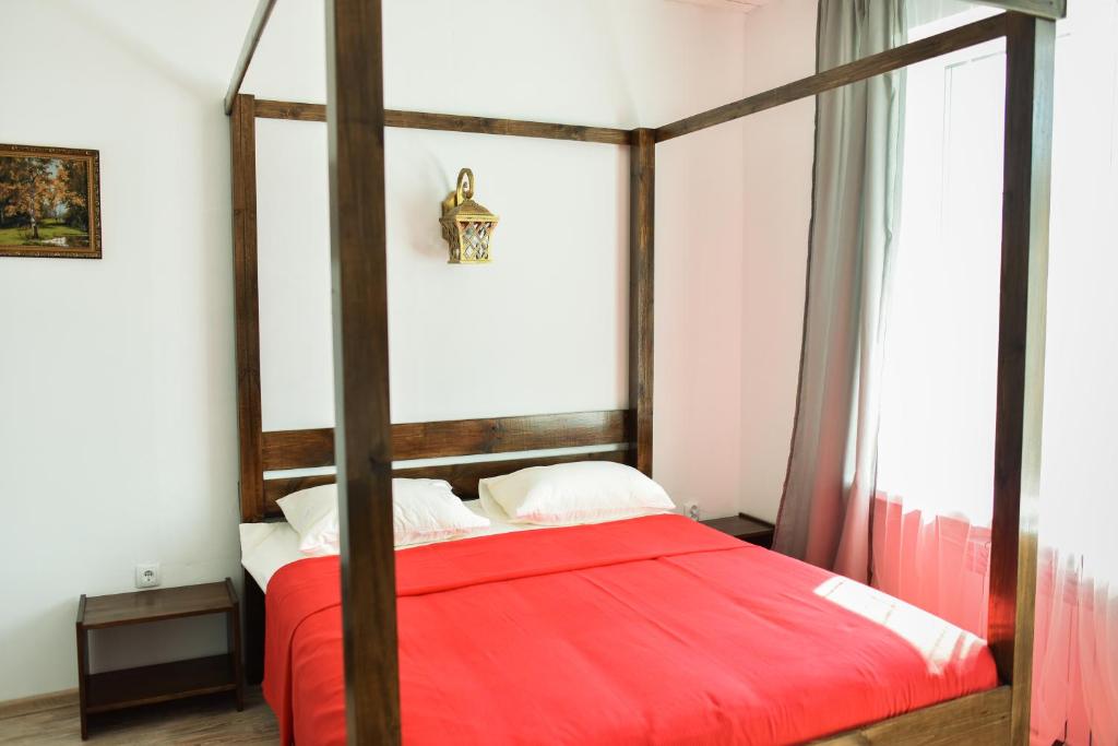
A bed or beds in a room at мини отель "Гостевой Дом 33"
