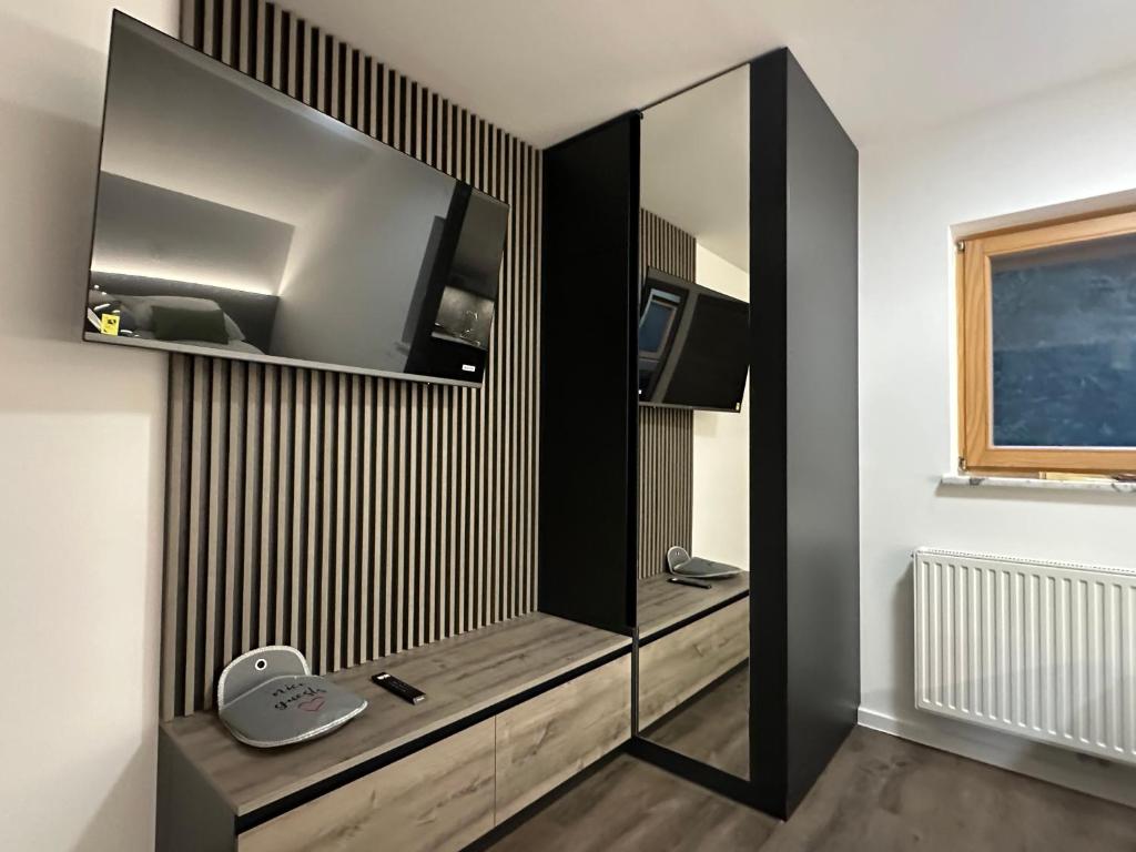 TV a/nebo společenská místnost v ubytování 4 Elements Resort Bled