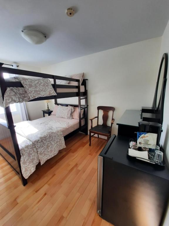 Postel nebo postele na pokoji v ubytování Auberge Schweizer