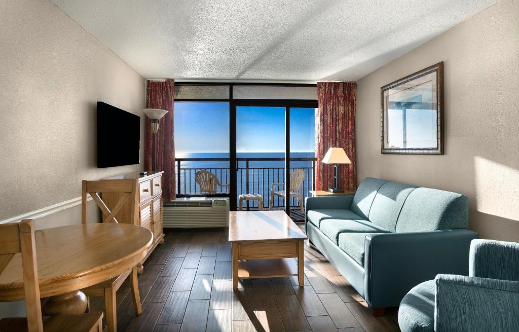 Televiisor ja/või meelelahutuskeskus majutusasutuses Monterey Bay Suites