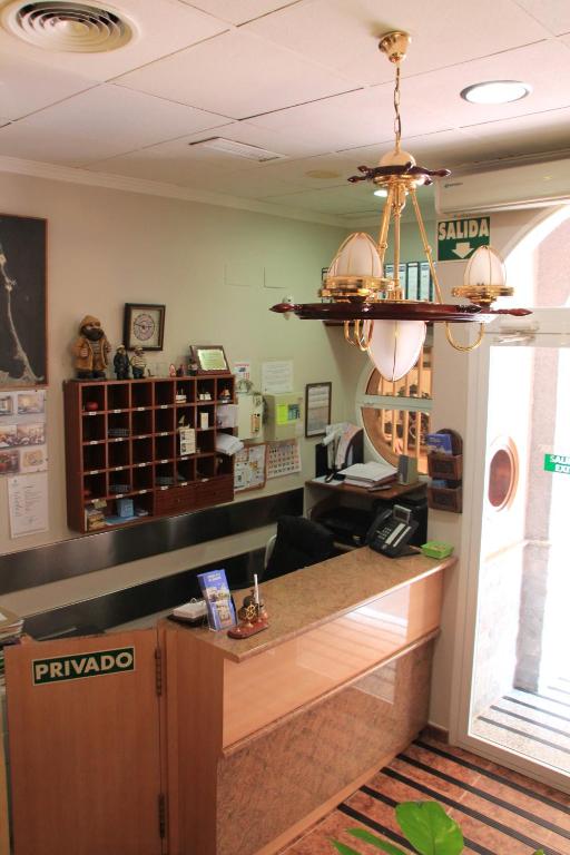 Kuchyň nebo kuchyňský kout v ubytování Hotel El Marino