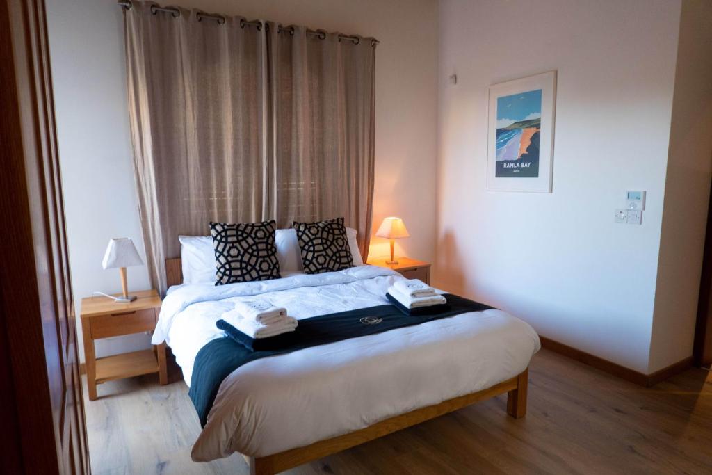 Postel nebo postele na pokoji v ubytování OneFifty Holiday Home