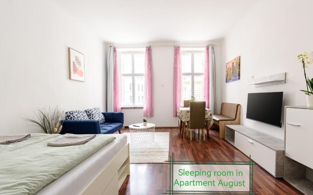a bedroom with a bed and a living room at 7brunnen Hostel Beds & Rooms in Vienna