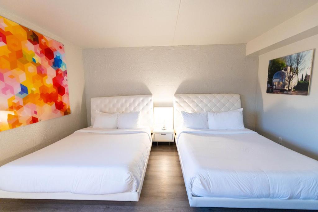 Postel nebo postele na pokoji v ubytování The Clarendon Hotel and Spa
