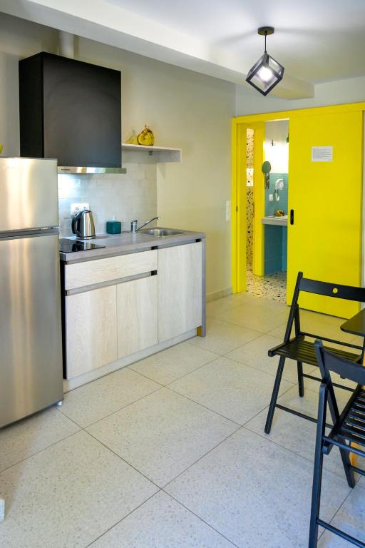 Kuchyň nebo kuchyňský kout v ubytování Bikini Apartments