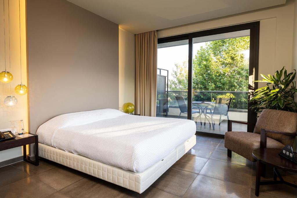 Posteľ alebo postele v izbe v ubytovaní Ananti Resort & Spa