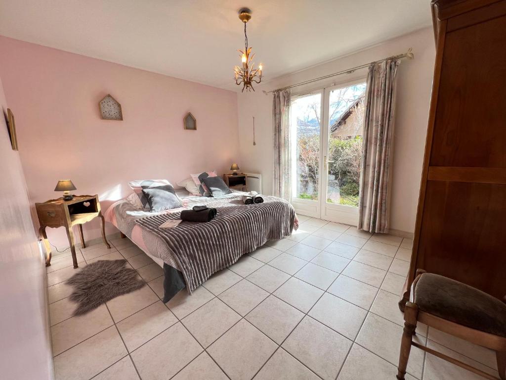 Postel nebo postele na pokoji v ubytování MAISON DES VIGNES