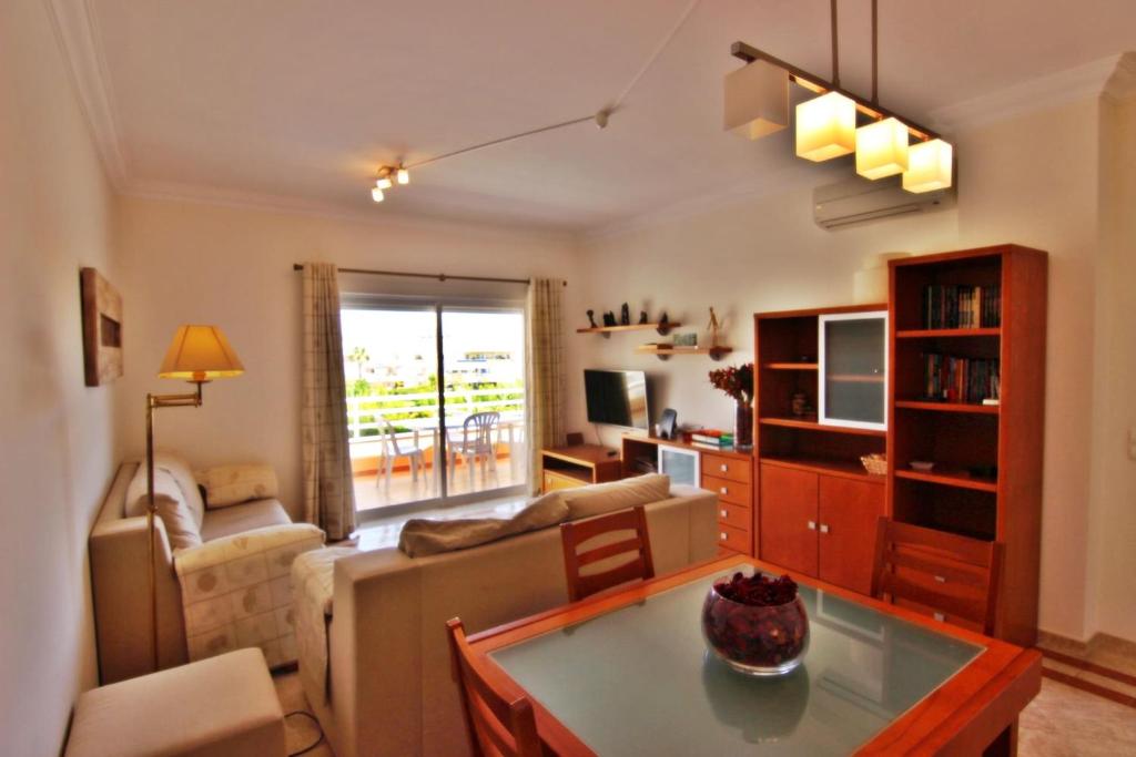 TV a/nebo společenská místnost v ubytování ViaMar Apartment