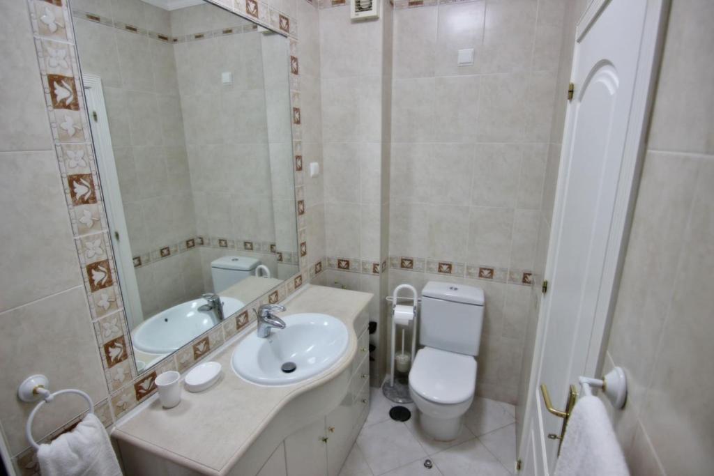 Koupelna v ubytování ViaMar Apartment