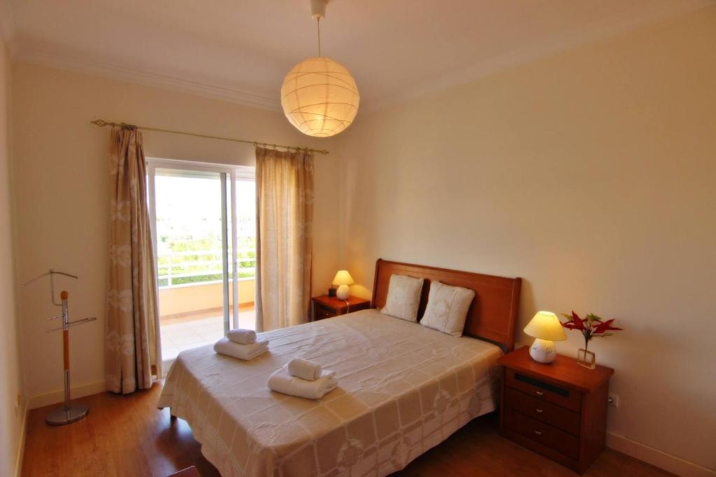 Postel nebo postele na pokoji v ubytování ViaMar Apartment