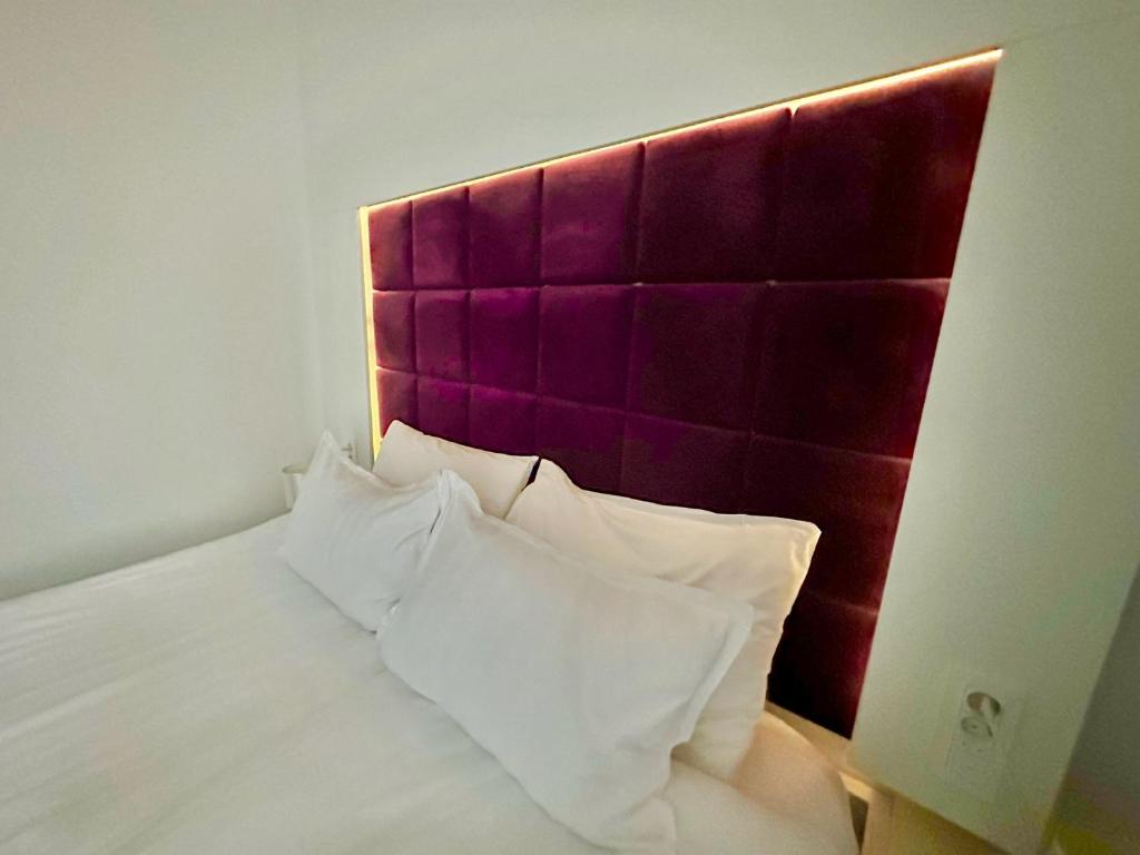 Ein Bett oder Betten in einem Zimmer der Unterkunft Bed & Breakfast Donji Grad