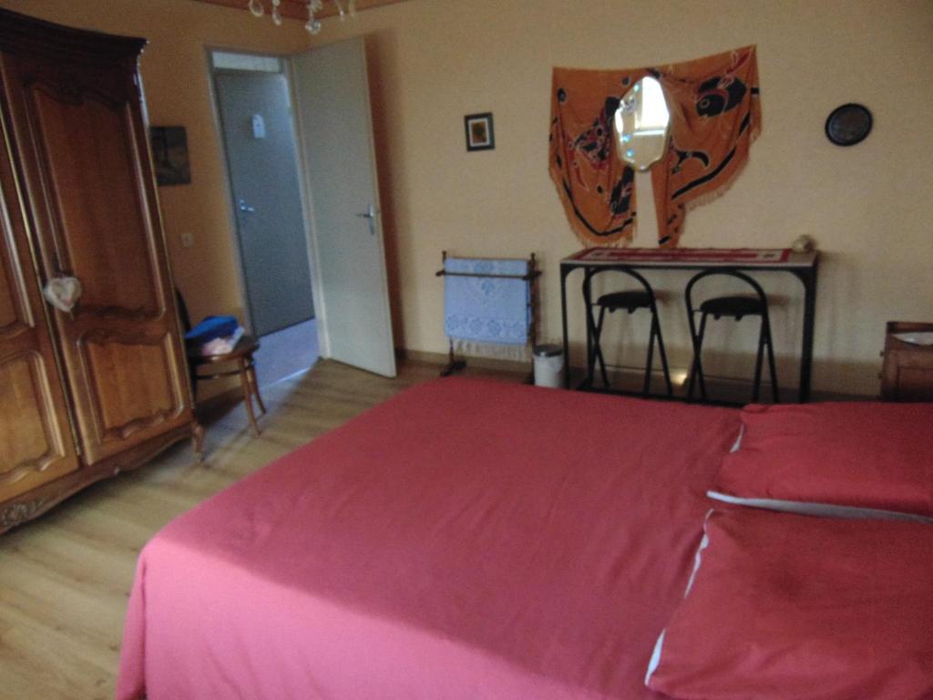 Postel nebo postele na pokoji v ubytování Séjour au Naturel chez l'habitant