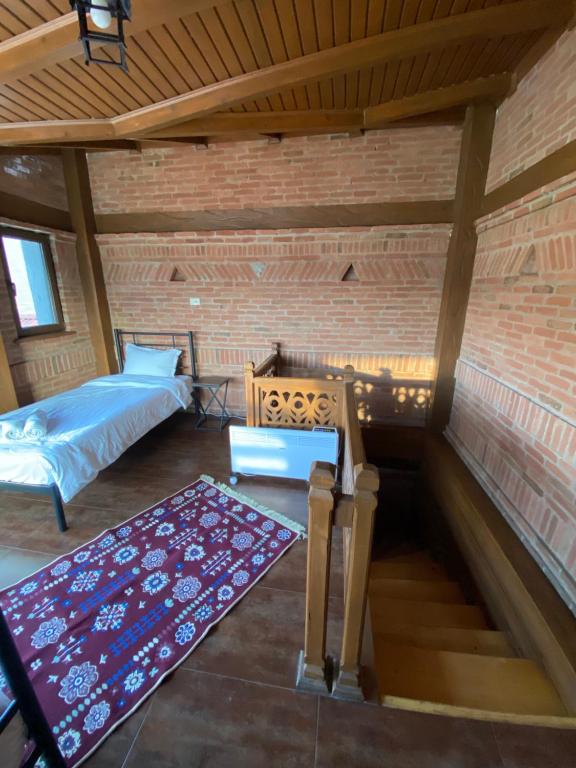 Postel nebo postele na pokoji v ubytování Hotel Ananuri