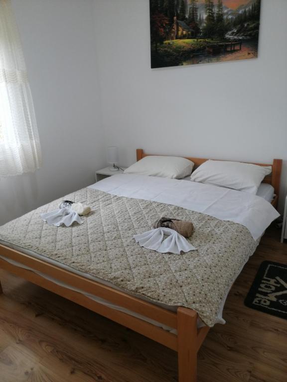 Postel nebo postele na pokoji v ubytování Apartman Mila