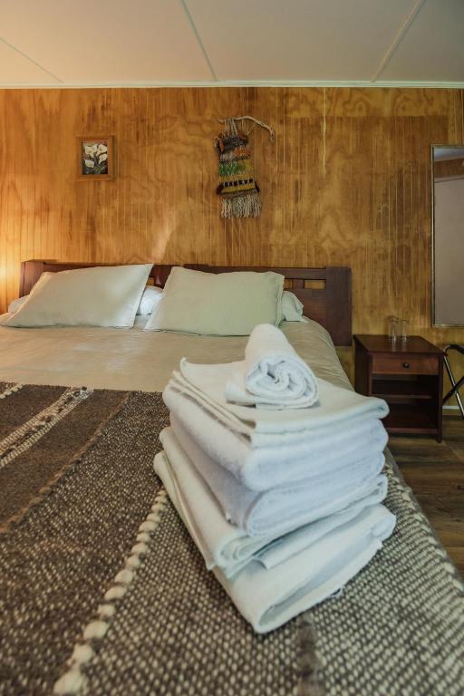 Postel nebo postele na pokoji v ubytování Hostal Viento Sur