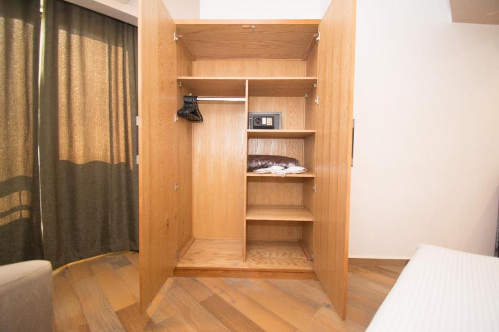 Postel nebo postele na pokoji v ubytování Nile Guardian Hotel