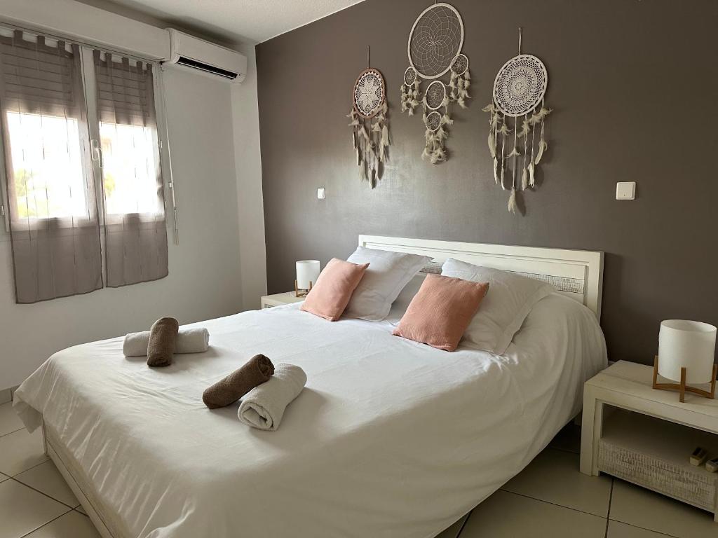 Postel nebo postele na pokoji v ubytování Appartement Ti Vaniy, T3, Anse Mitan, Trois ilets, Martinique