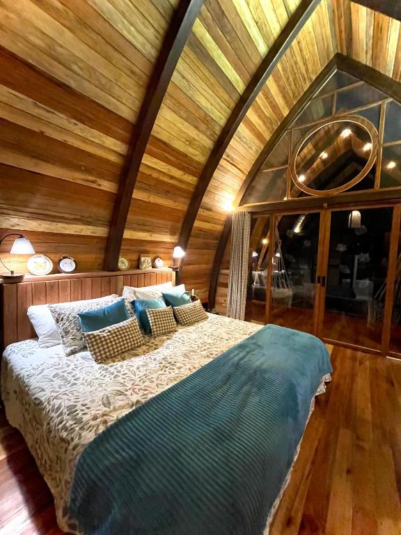 Postel nebo postele na pokoji v ubytování Sacha Urco Lodge y Bosque Protector