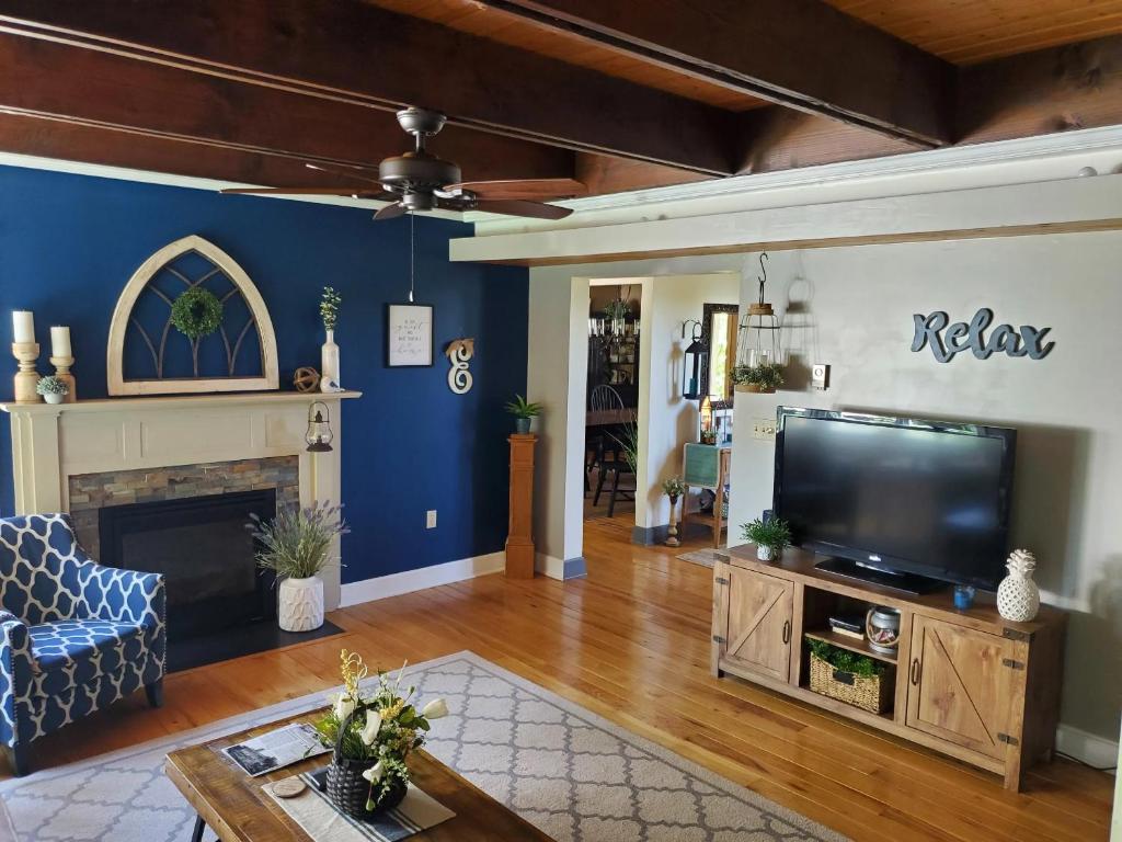 TV o dispositivi per l'intrattenimento presso Paper Mill Pines Bed and Breakfast