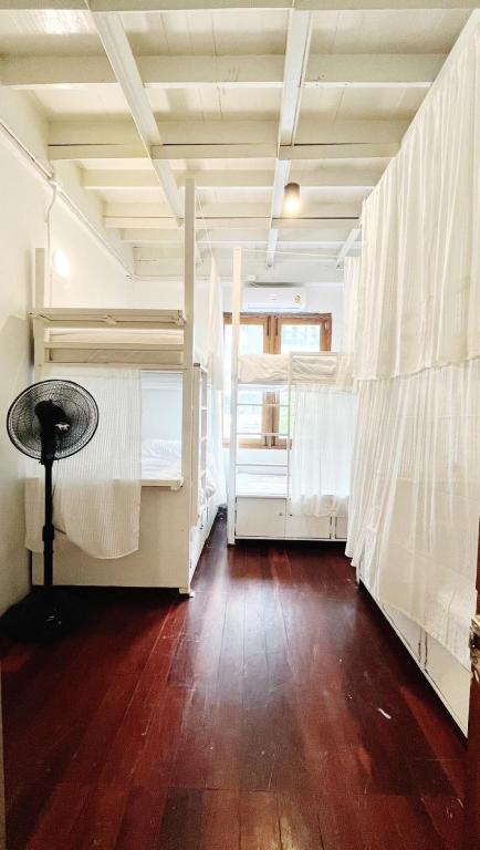 Postel nebo postele na pokoji v ubytování Rotinis Hostel