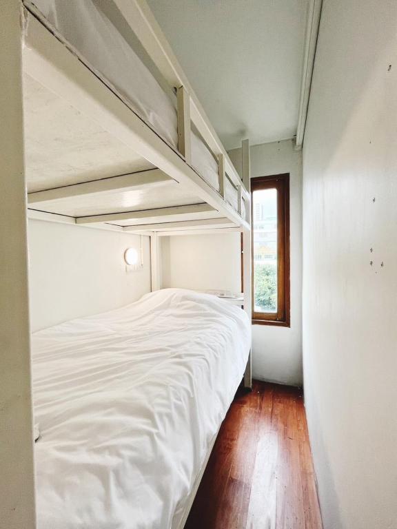 Postel nebo postele na pokoji v ubytování Rotinis Hostel
