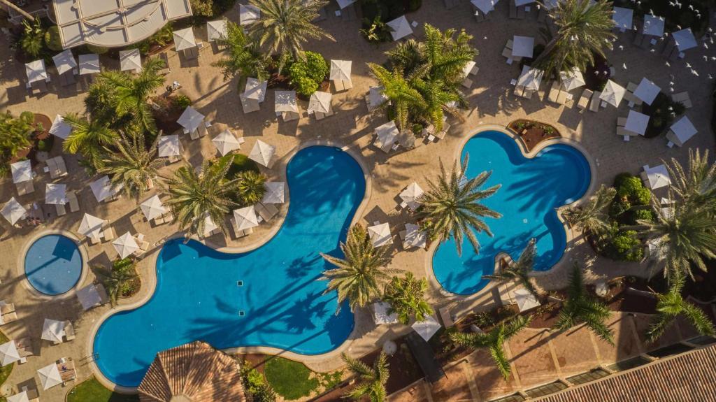 Piscine de l'établissement Secrets Bahía Real Resort & Spa Adults only ou située à proximité