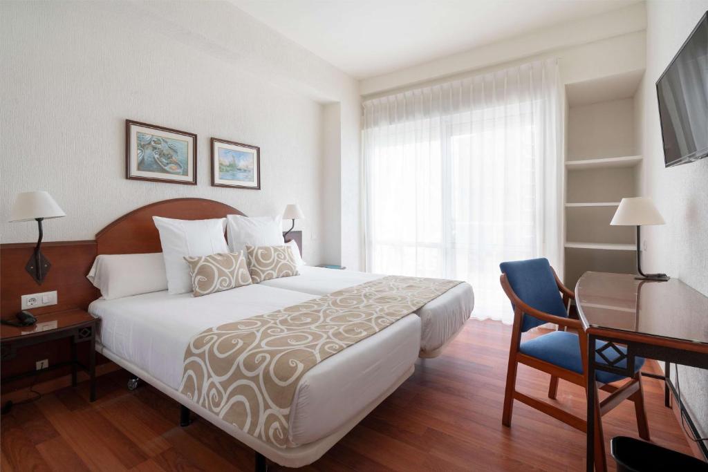 Cama o camas de una habitación en AluaSun Doblemar