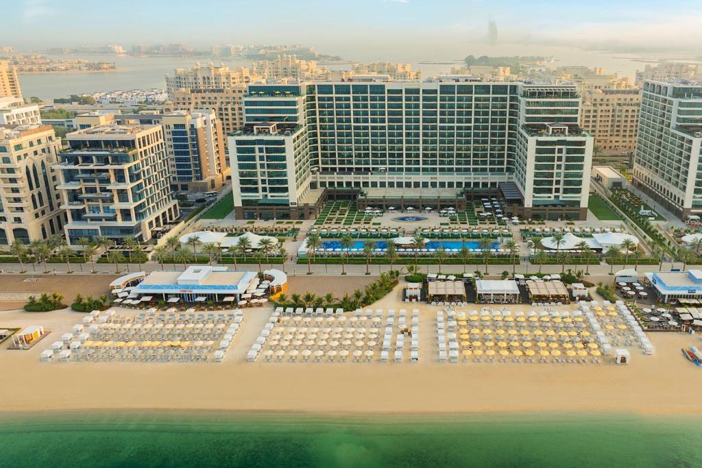 an aerial view of a resort with a beach and buildings at Marriott Resort Palm Jumeirah, Dubai in Dubai