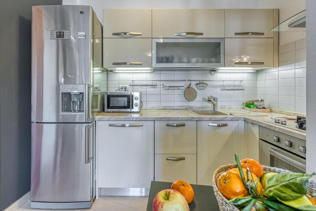 Kuchyň nebo kuchyňský kout v ubytování Apartment Dea - Three Bedroom Apartment