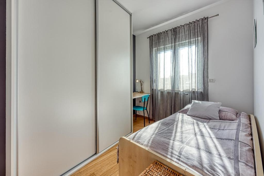 Postel nebo postele na pokoji v ubytování Apartment Dea - Three Bedroom Apartment