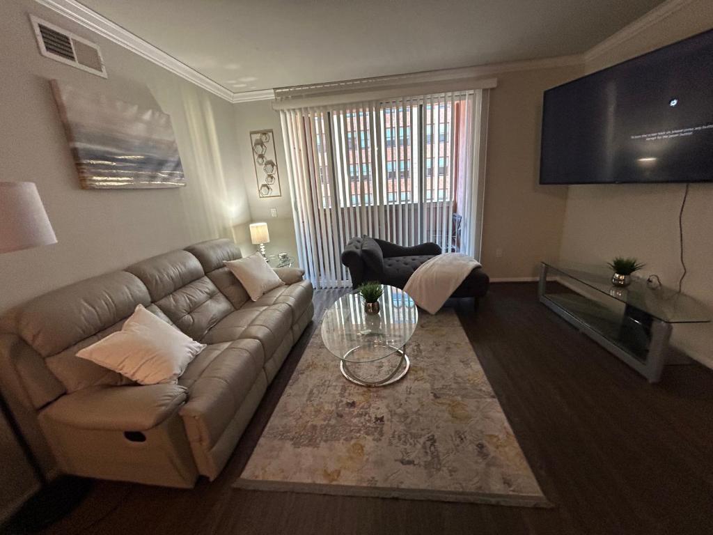 a living room with a couch and a table at 2 Bedroom Apartment Downtown LA! in Los Angeles