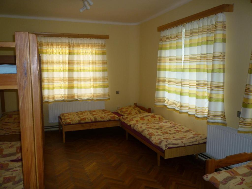 Postel nebo postele na pokoji v ubytování Penzion Neco