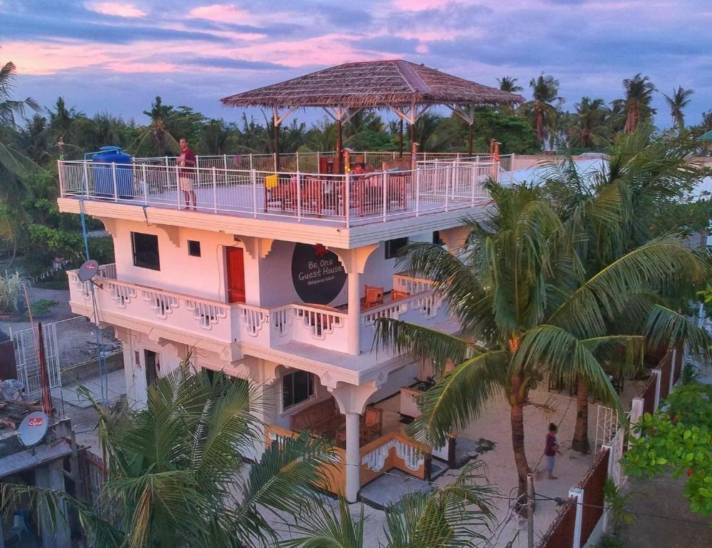 an aerial view of a resort building with a deck at Malapascua Be One Guesthouse in Malapascua Island