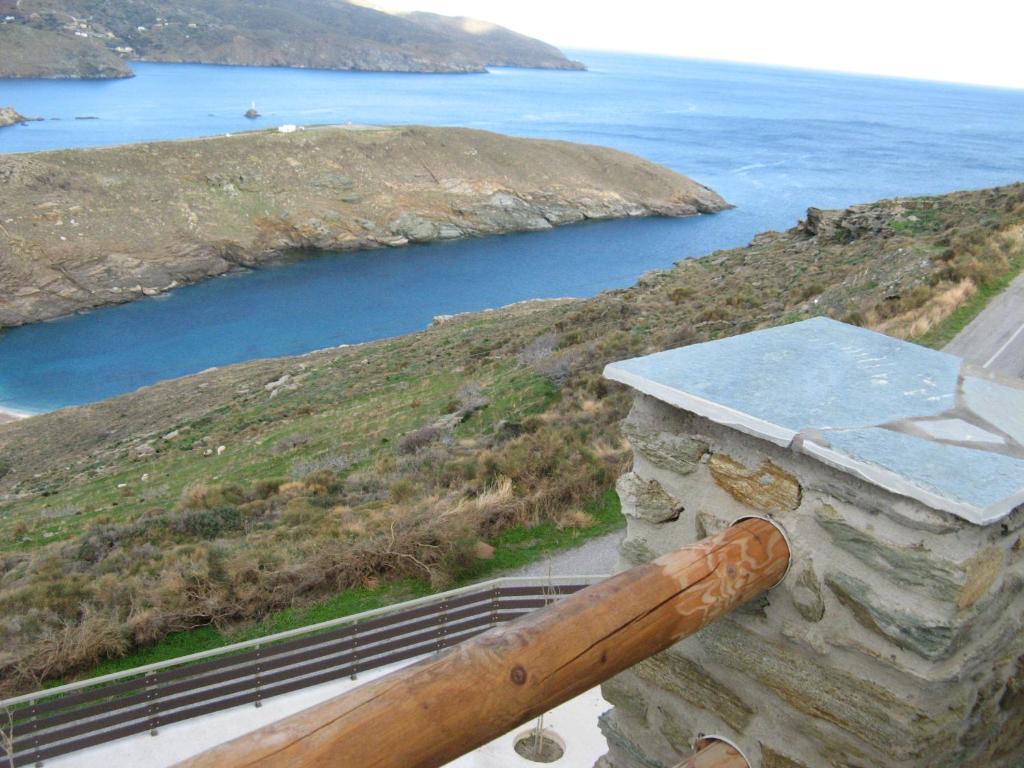 a baseball bat sitting on top of a stone wall at De La Rocka in Sinétion