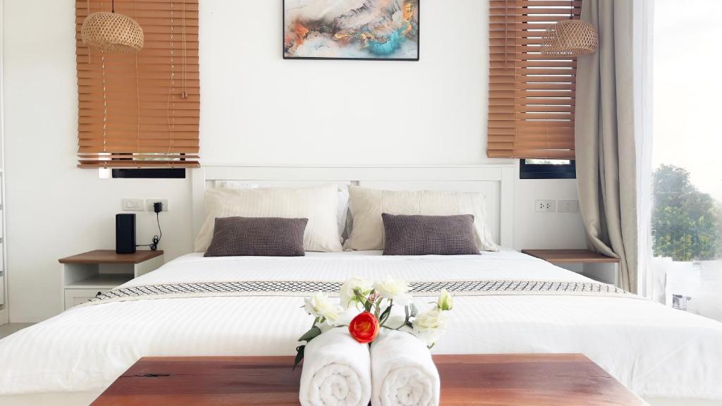 Postel nebo postele na pokoji v ubytování Infinity Villa