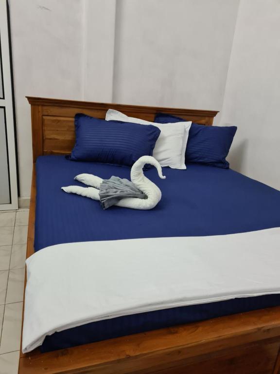 Postel nebo postele na pokoji v ubytování Edwin Villa