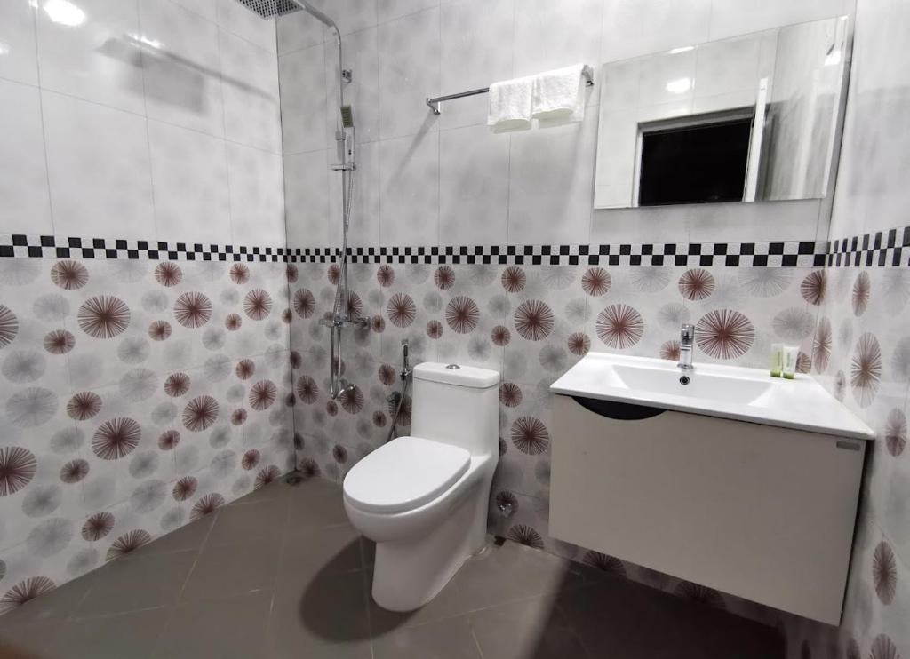 Koupelna v ubytování Rihiveli Inn