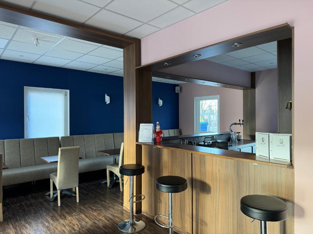 Kuchyň nebo kuchyňský kout v ubytování Hotel Pankow
