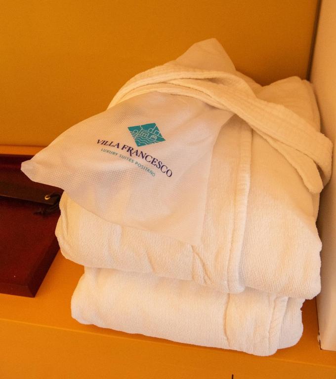 Postel nebo postele na pokoji v ubytování Villa Francesco Luxury Suites