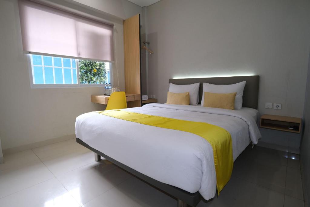 Postel nebo postele na pokoji v ubytování S101 Hotels