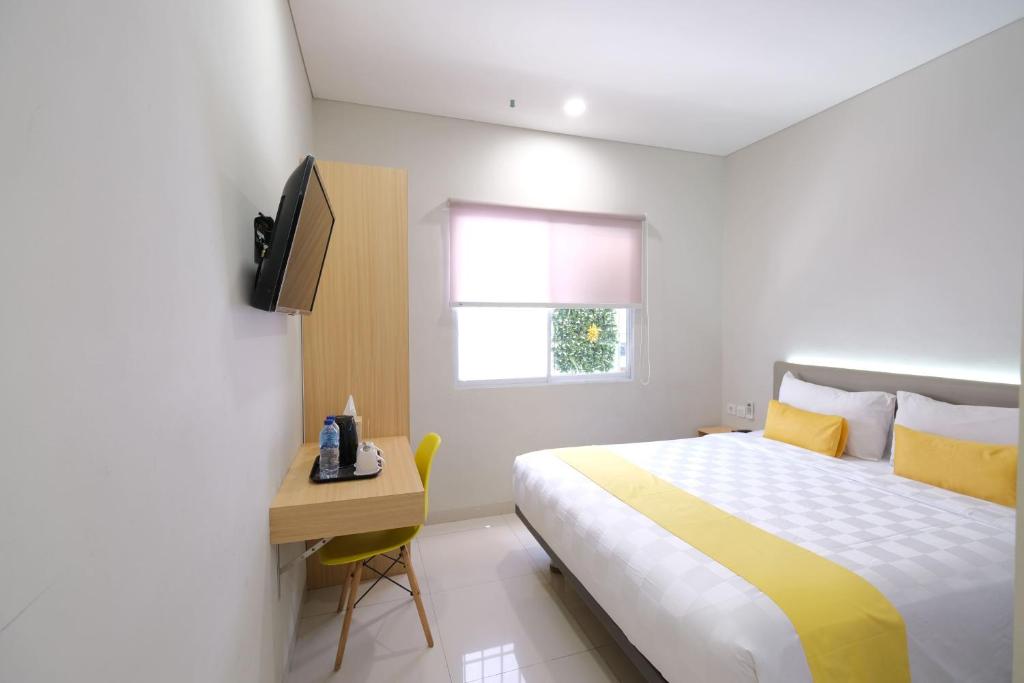 Postel nebo postele na pokoji v ubytování S101 Hotels