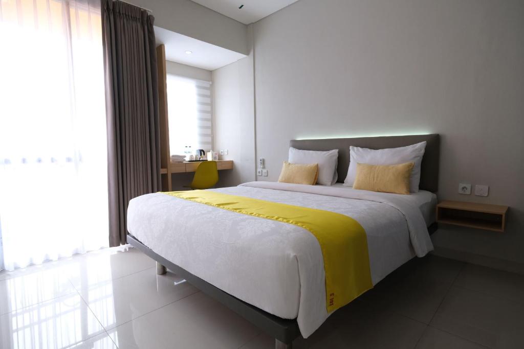 Postel nebo postele na pokoji v ubytování S101 Hotels