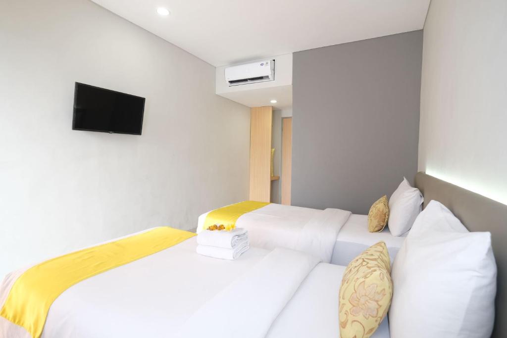 Postel nebo postele na pokoji v ubytování S101 Hotels