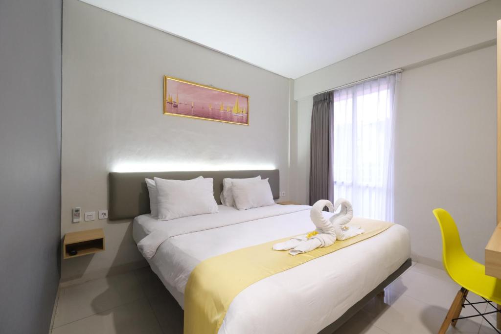 Postel nebo postele na pokoji v ubytování S101 Hotels