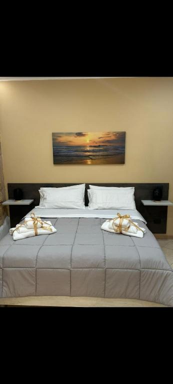 Postel nebo postele na pokoji v ubytování KALGHEROS Luxury Rooms