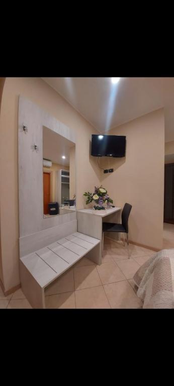 Kuchyň nebo kuchyňský kout v ubytování KALGHEROS Luxury Rooms