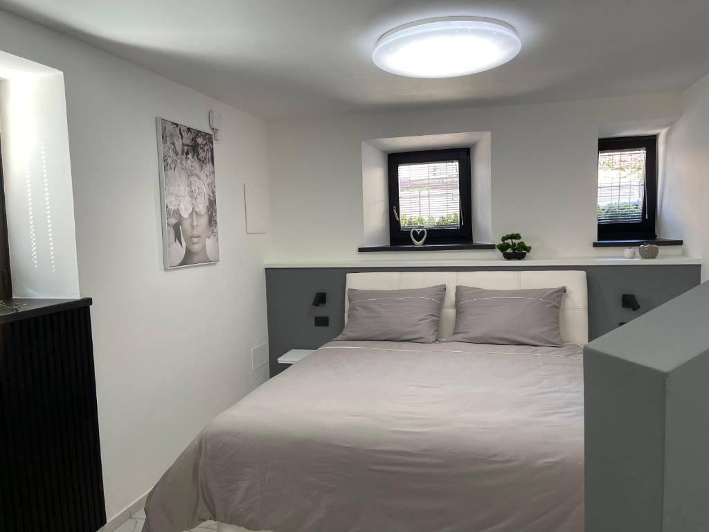 Postel nebo postele na pokoji v ubytování Apartment Aria